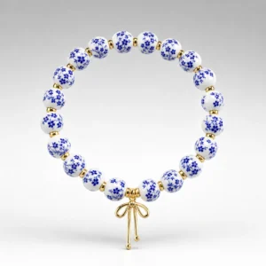 Blue Ceramic Bow Bracelet – Gold Tone