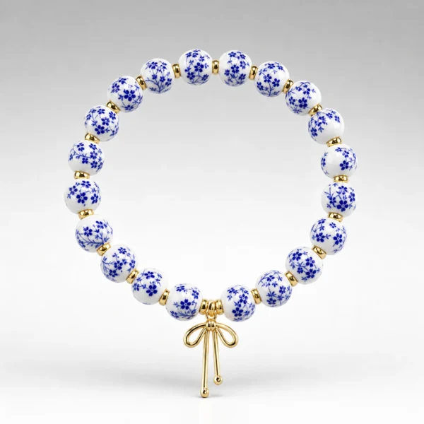 Blue Ceramic Bow Bracelet – Gold Tone