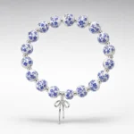 Blue Ceramic Bow Bracelet – Silver Tone main image