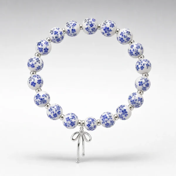 Blue Ceramic Bow Bracelet – Silver Tone
